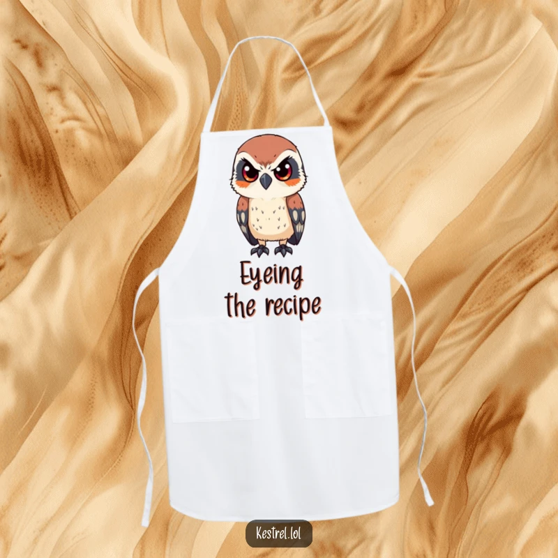 Funny apron with a kestrel character looking intently with sharp, focused eyes, adding humorous bird-lover charm to cooking, an ideal funny gift.