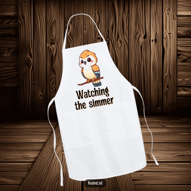 Funny winking kestrel apron, showing the bird playfully scouting from a high perch with a humorous wink, perfect kitchen wear.