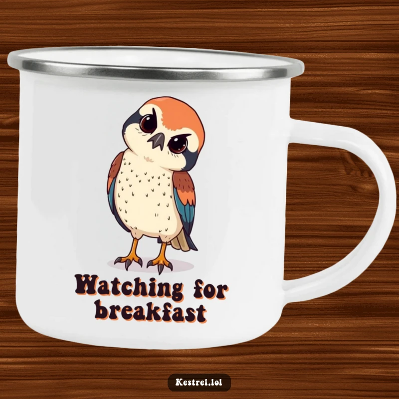 Funny kestrel tilts its head curiously, sharp eyes observing below, on a sturdy camping mug.