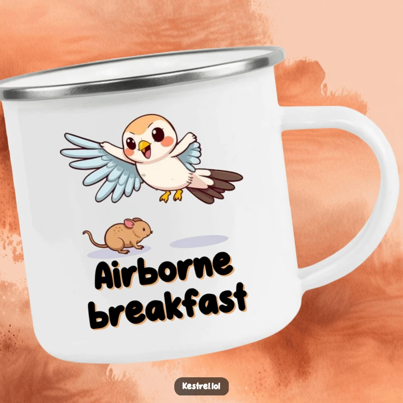 Funny camping mug showing a cartoon kestrel comically swooping down with outstretched wings, ready for outdoor fun.
