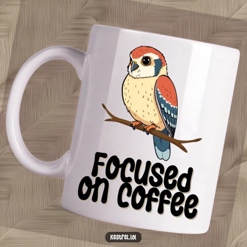 Funny kestrel mug showing a determined bird perched on a branch, looking intently, radiating focus and humor.