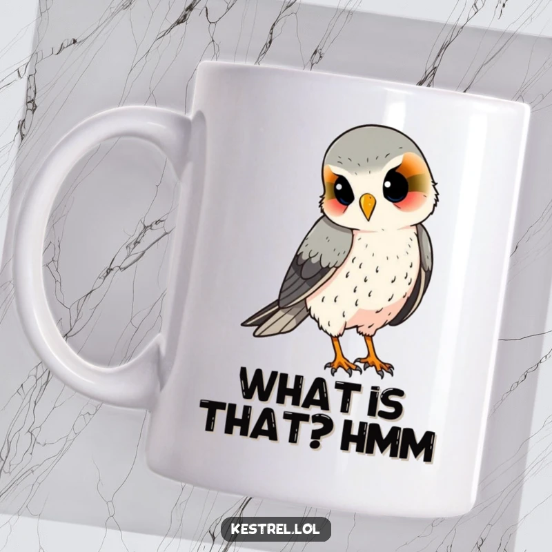 Funny kestrel mug, head tilted curiously, observing something below; ideal for bird watchers and thoughtful gift seekers.
