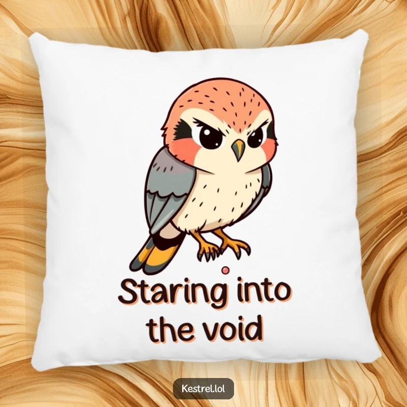 Funny Kestrel Pillow: A determined kestrel intently eyes a tiny movement below, its humorous focus adding character to the pillow.