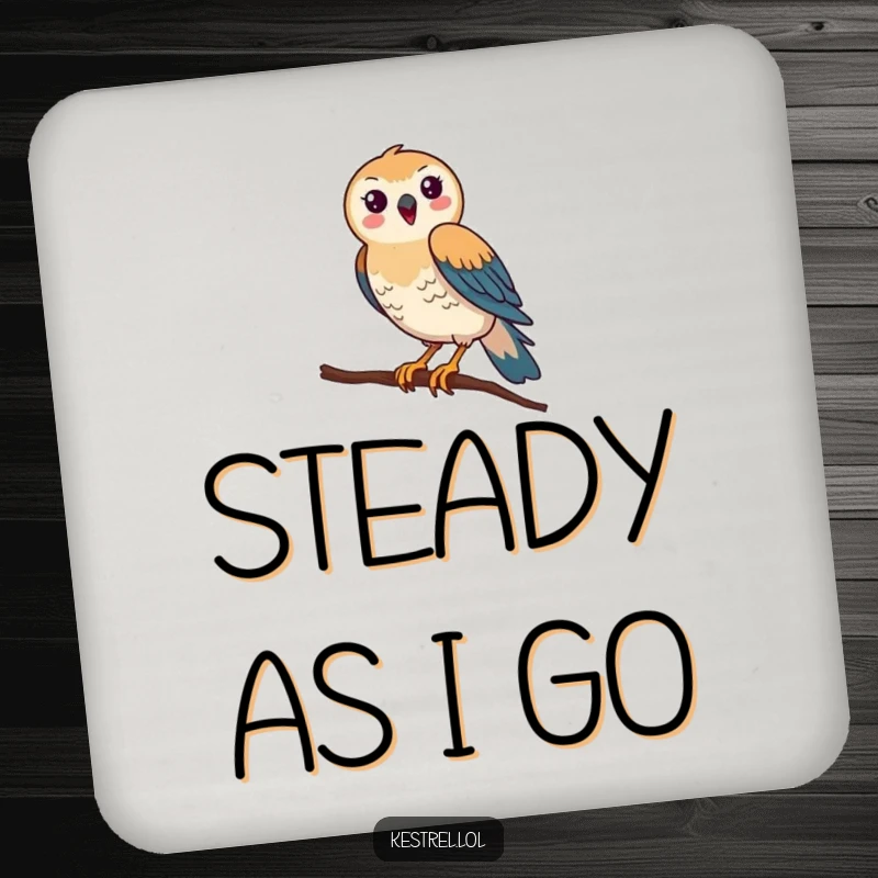 Funny Kestrel Coaster: A happy kestrel comically attempts to balance on a slender branch, protecting surfaces with humor.