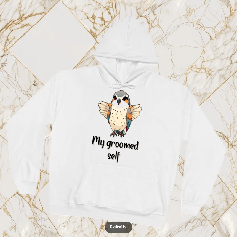 Funny kestrel preening sleek feathers with a proud, focused expression on a cozy hoodie.