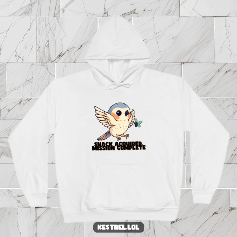 Funny kestrel hoodie depicting a bird expertly snagging a bug mid-air, combining warmth with humor, an excellent funny gift for nature fans.