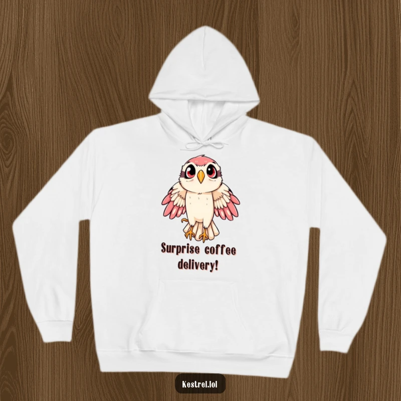 Funny kestrel hoodie showcasing a bird of prey in a dynamic, wide-eyed swoop, perfect for fans of aerial maneuvers.