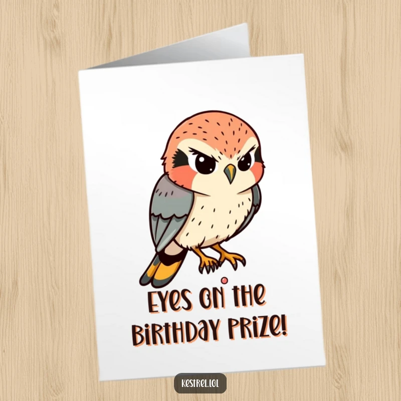Funny Free Printable Birthday Card: A determined kestrel intently eyes a tiny movement below, focusing on its birthday wish.