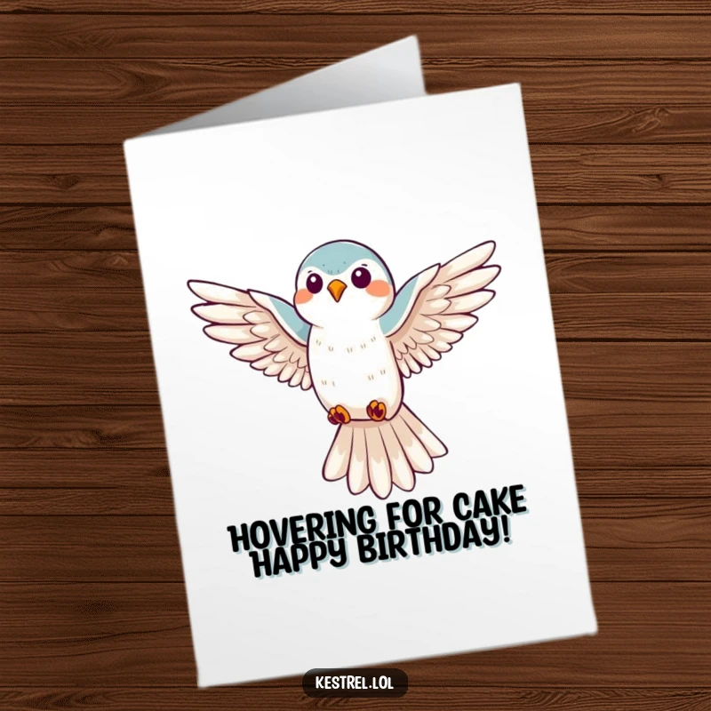 Funny Free Printable Birthday Card: A happy kestrel hovers with wings spread, looking down with a smile, ready to deliver birthday wishes.