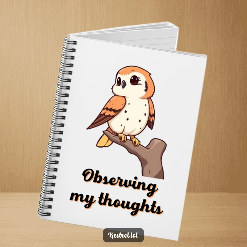 Funny kestrel notebook featuring a bird of prey keenly observing from a high perch, ideal for journaling and note-taking.