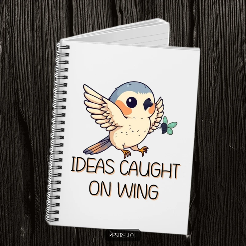 Funny kestrel notebook featuring a bird catching a bug mid-air, perfect for notes and inspiration, a humorous bird-themed gift.