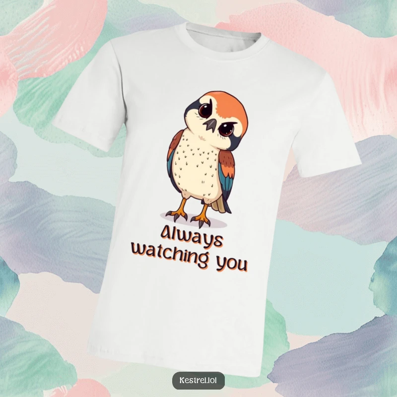 Funny kestrel tilts its head curiously, observing below with sharp eyes, printed on a quirky t-shirt.
