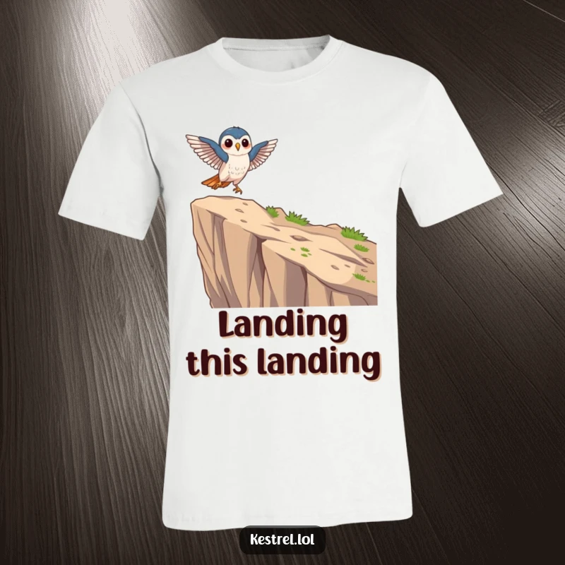Funny focused kestrel t-shirt depicting a kestrel character landing gracefully on a cliff edge, exuding focus.