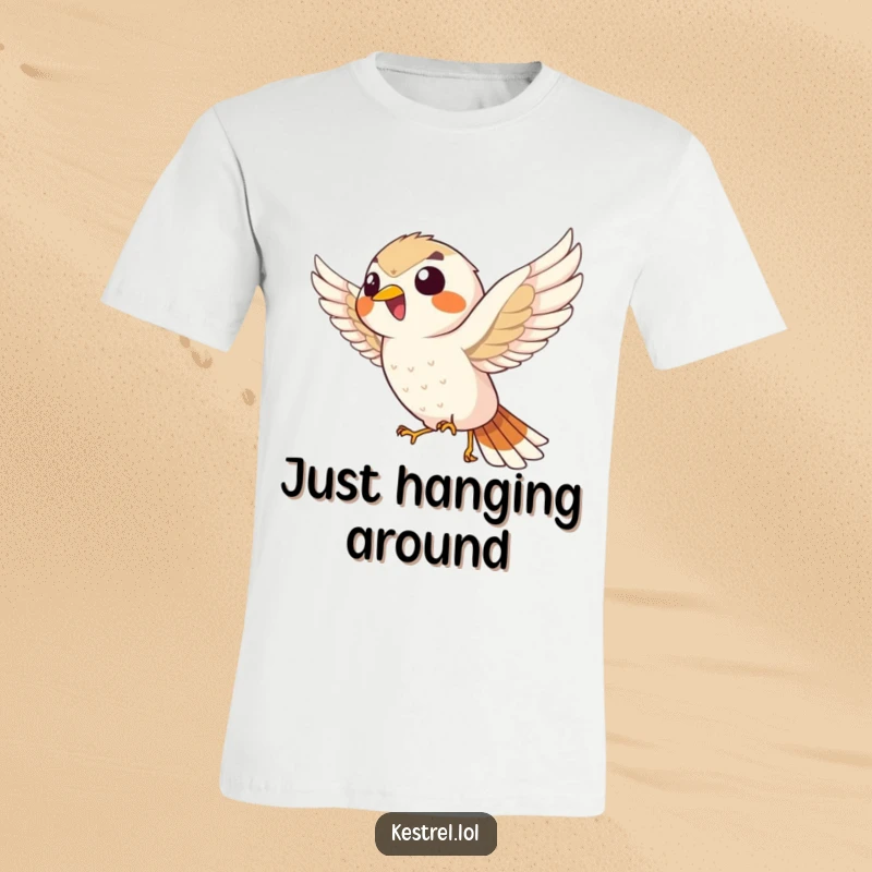 Funny giggling kestrel t-shirt, joyfully hovering in the wind, capturing a moment of pure, unadulterated avian amusement.