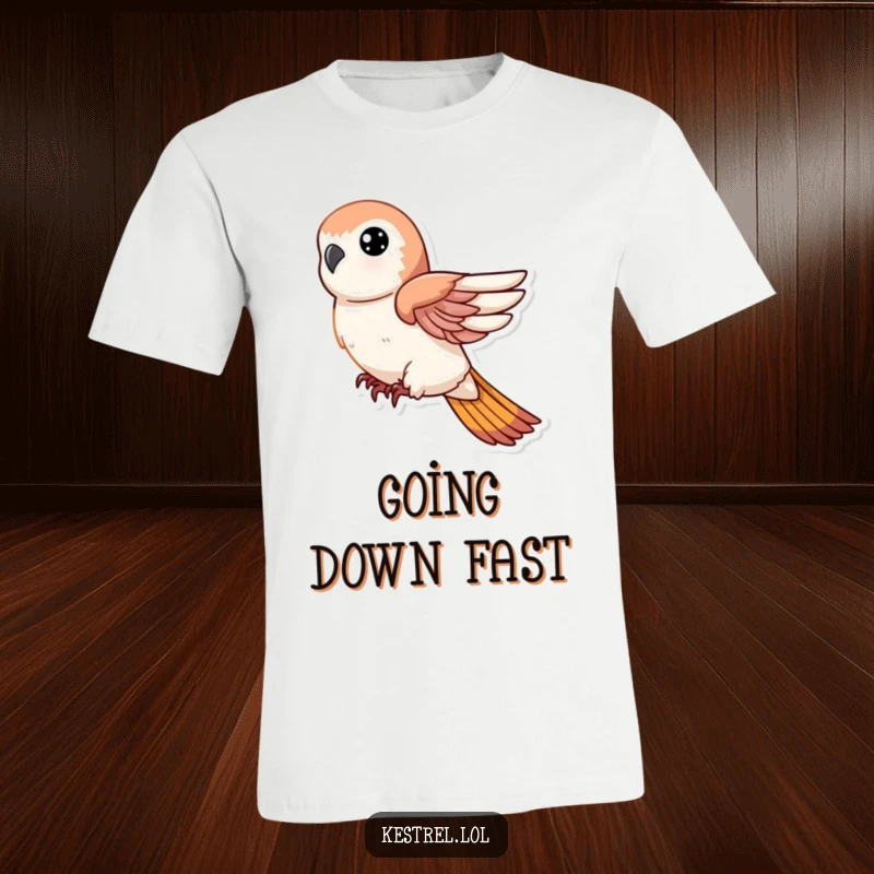 Funny t-shirt featuring a kestrel character in a swift, powerful descent with wings tucked tightly, embodying speed.