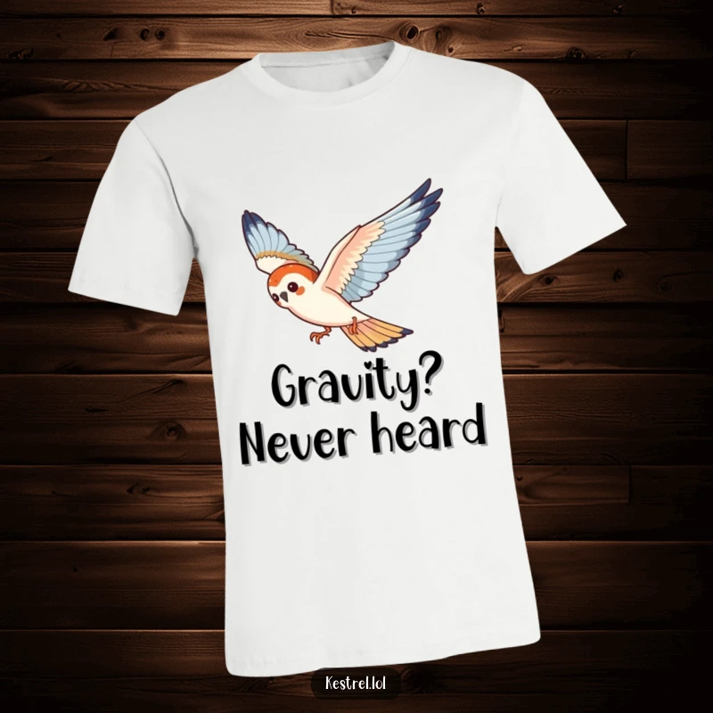Funny kestrel t-shirt featuring a playful bird gracefully diving through the air, full of energy.