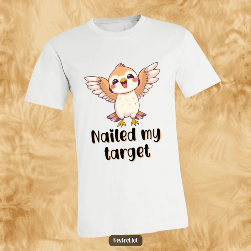 Funny kestrel t-shirt featuring a joyful bird celebrating a successful catch with wide open wings. Humorous and celebratory.