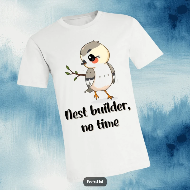 Funny kestrel t-shirt showing a kestrel diligently carrying a twig, symbolizing busyness and determination.