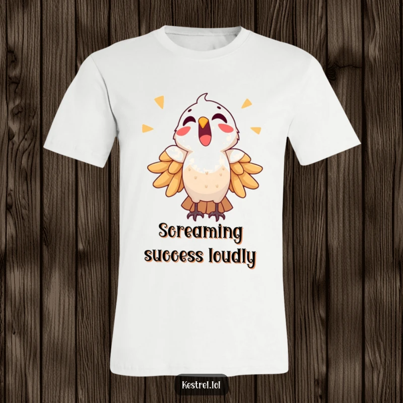 Funny triumphant kestrel t-shirt depicts a bird shouting joyfully, celebrating a major win or accomplishment.
