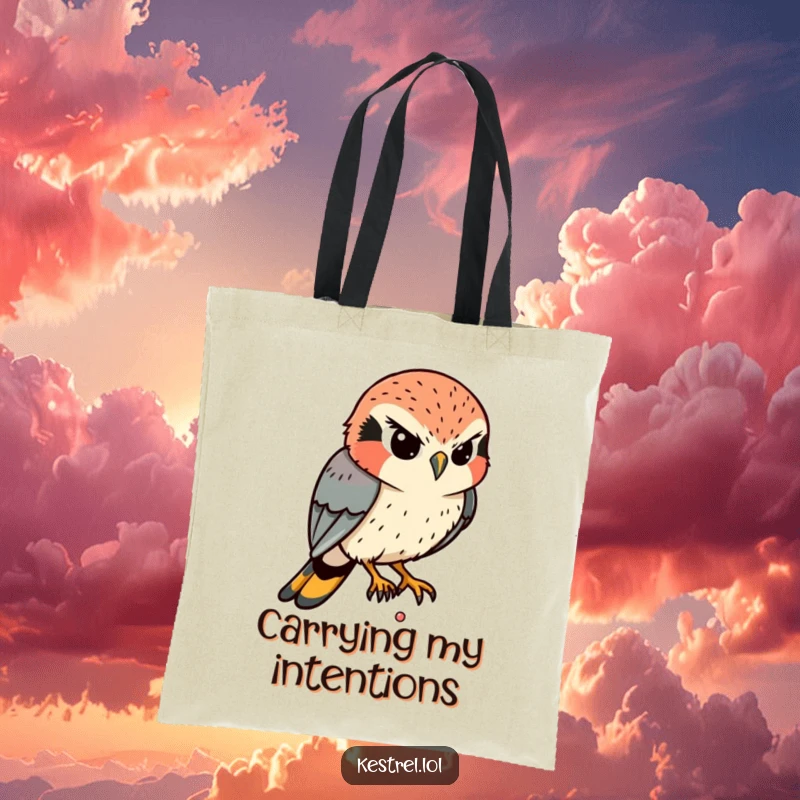 Funny Kestrel Tote Bag: A determined kestrel intently eyes a tiny movement below, its focused expression hilariously intense.