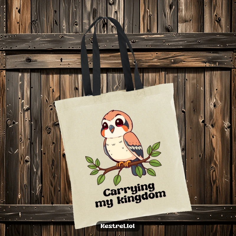 Funny kestrel tote bag with a happy bird perched on a branch, looking around. Practical and humorous.