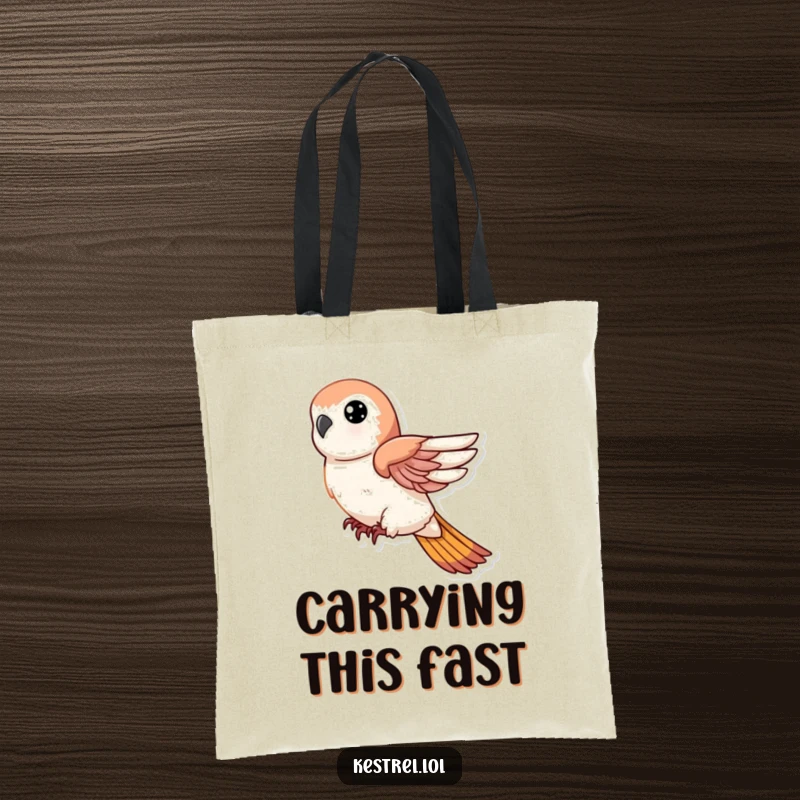 Funny tote bag featuring a kestrel character in a swift descent with wings tucked, perfect for carrying a dynamic vibe.