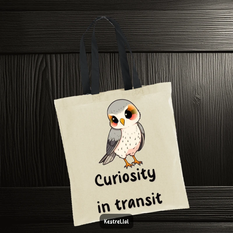 Funny kestrel tote bag, featuring a curious bird looking down with a tilted head, a stylish accessory.