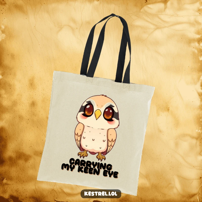 Funny kestrel tote bag with a smiling character intently watching from above, great for shopping and carrying essentials with a watchful eye.