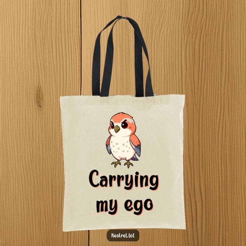 Funny proud kestrel tote bag depicting a kestrel character puffing its chest with determination, great for daily use.