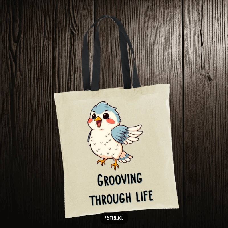 Funny kestrel tote bag with a delighted bird dancing in the wind, feathers ruffled, ideal for carrying items humorously.