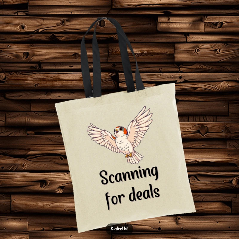Funny kestrel tote bag depicting a majestic bird of prey soaring with wings spread wide, perfect for carrying items with focused intent.